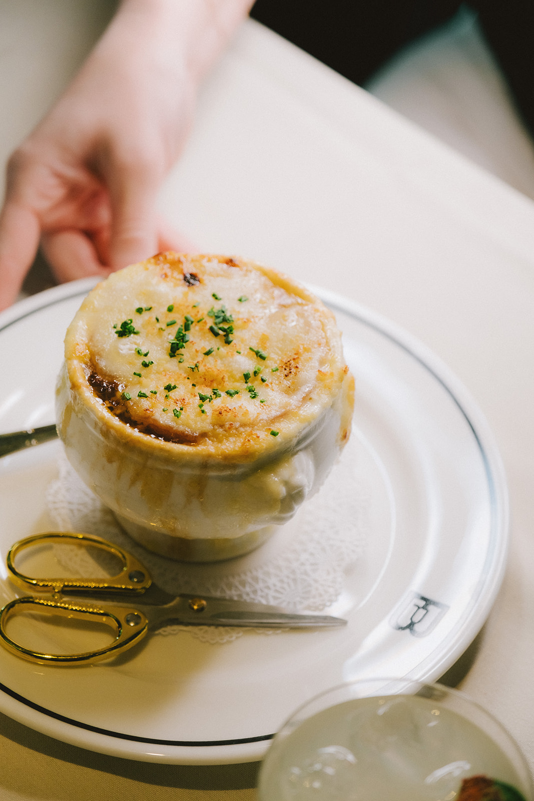 a bowl of soup on a plate