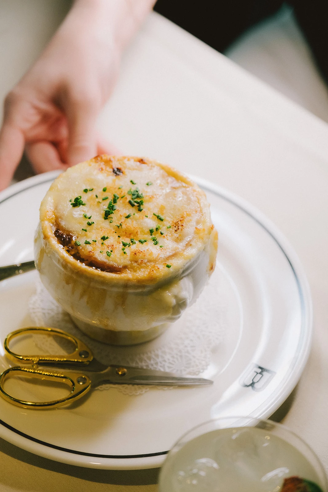 a bowl of soup on a plate