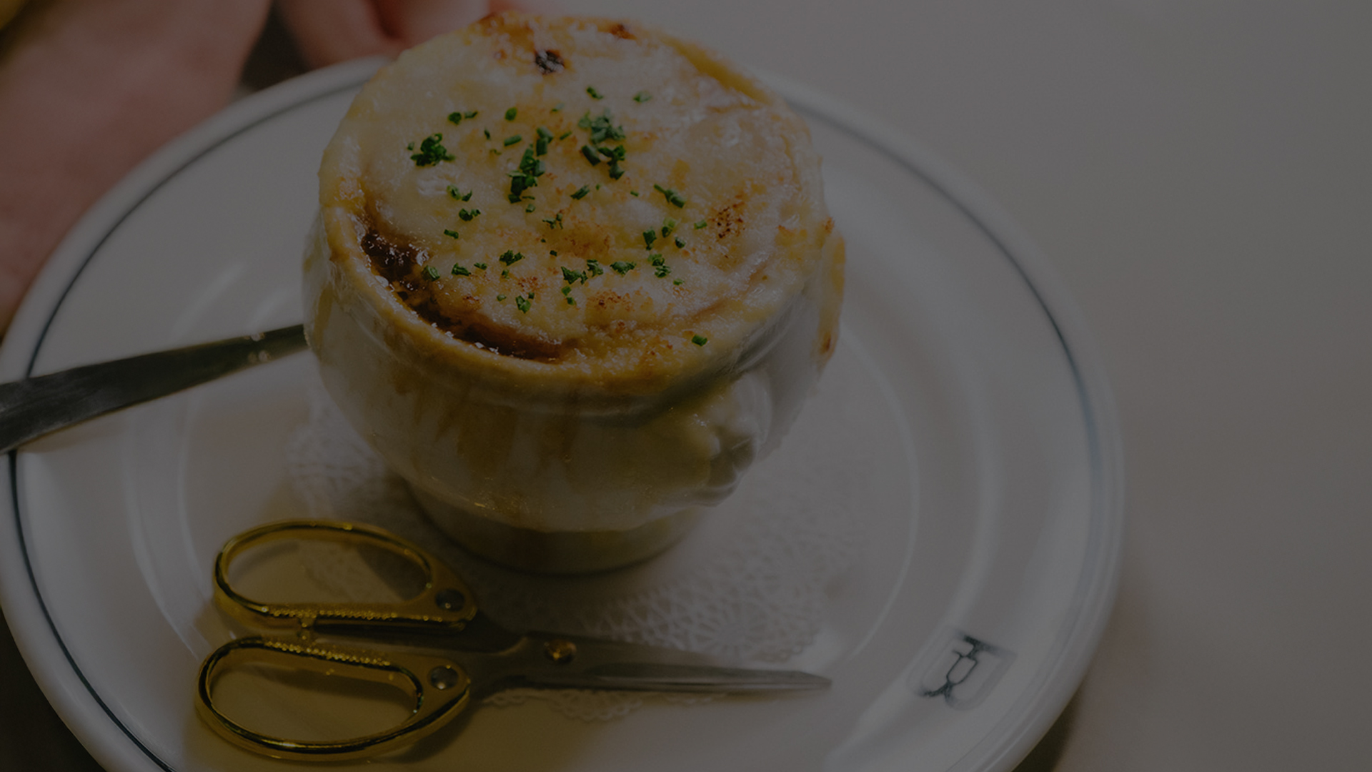 a bowl of soup on a plate