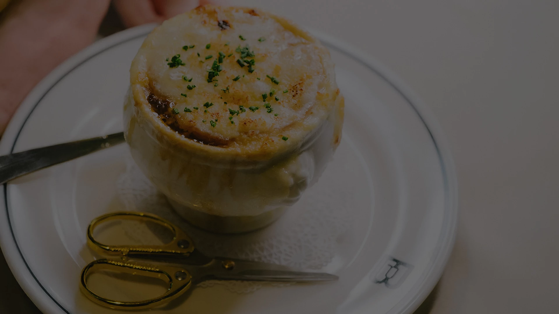 a bowl of soup on a plate