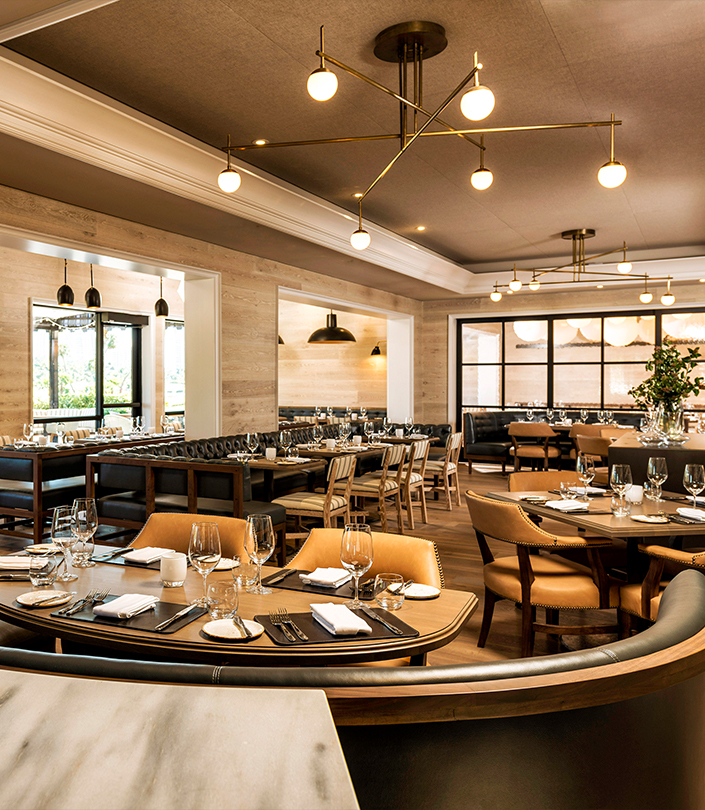 a restaurant with tables and chairs