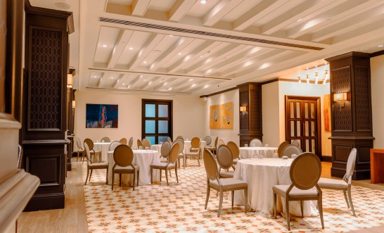 a room with tables and chairs