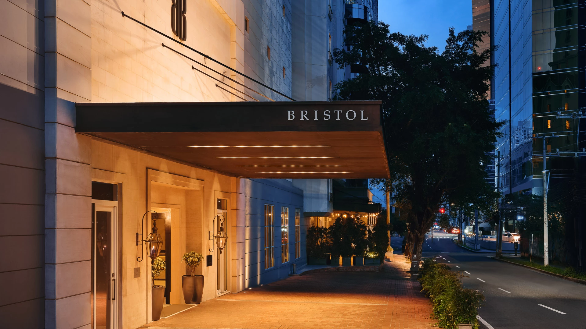 a building with a awning and trees