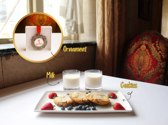 a plate of cookies and milk on a table