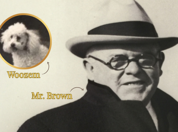 a man wearing a hat and glasses