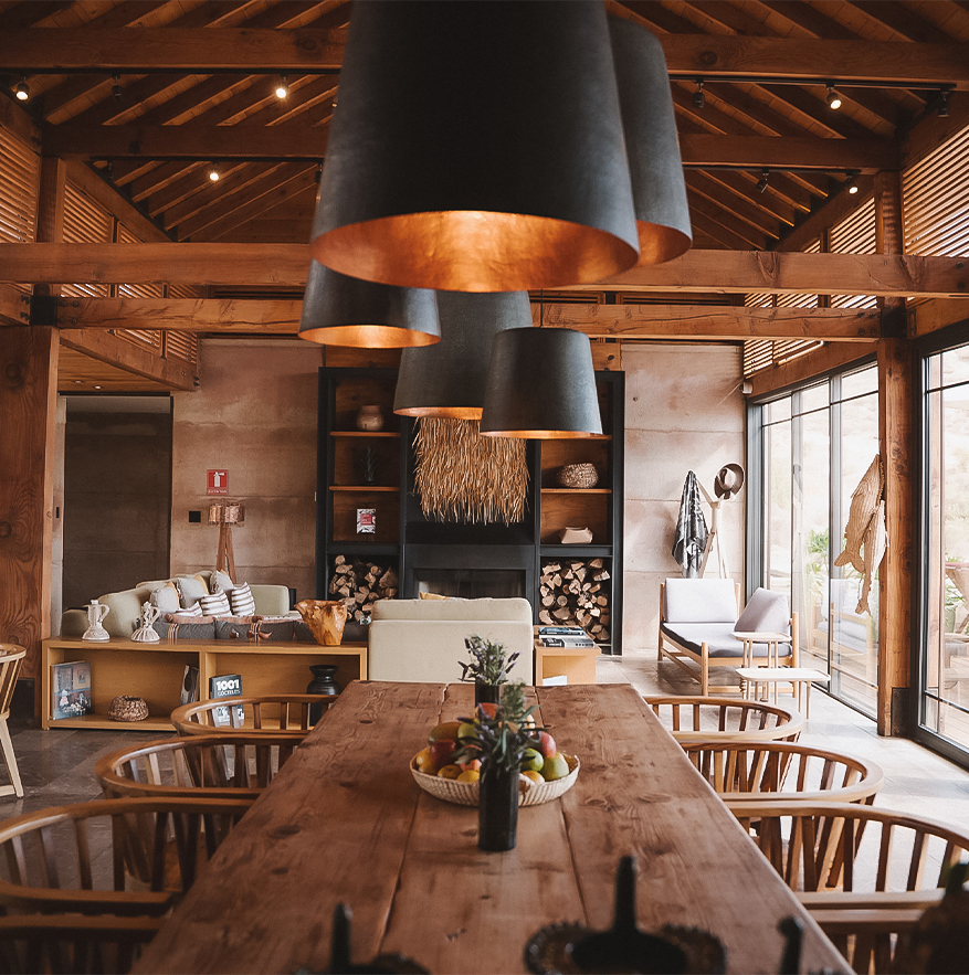 a room with a table and chairs