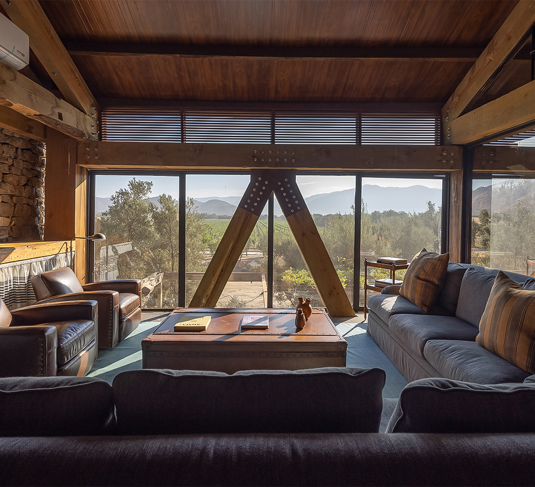 a living room with couches and a coffee table