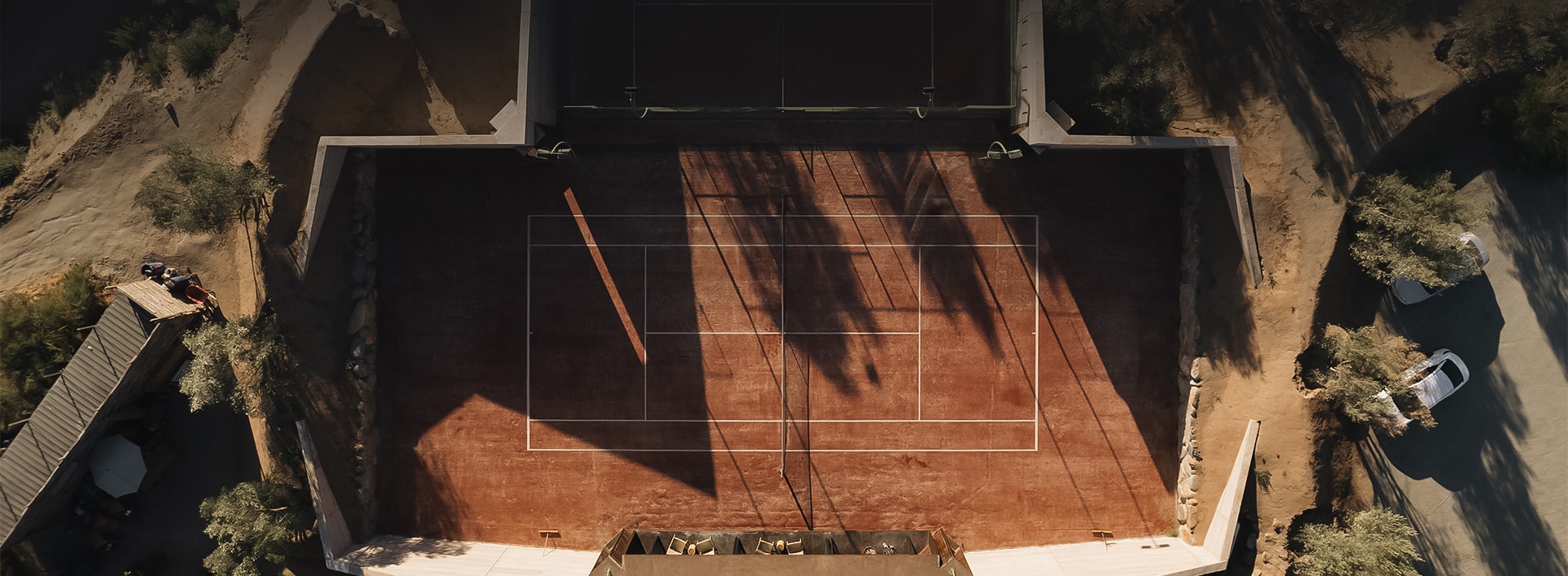 an aerial view of a tennis court