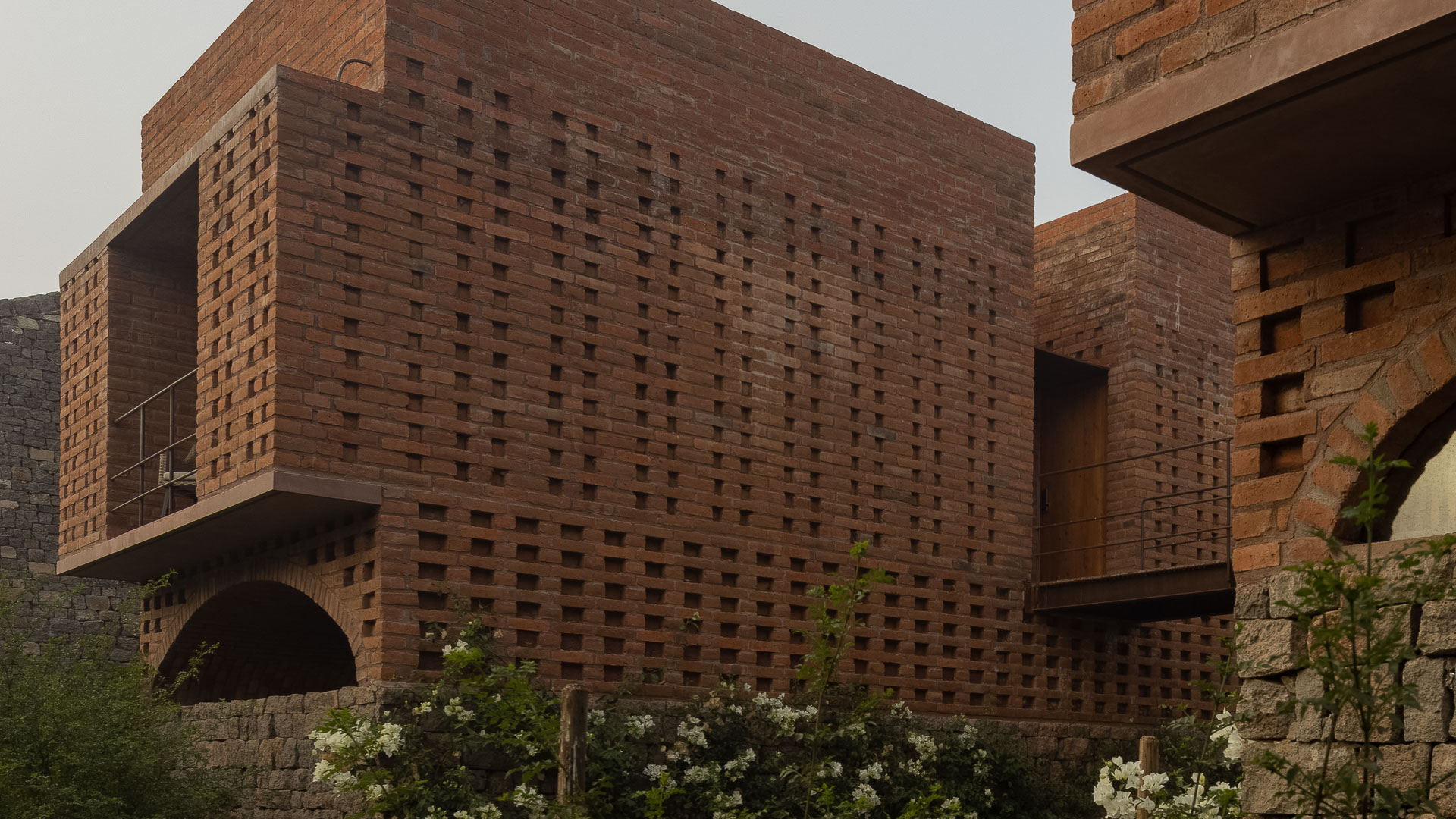 a brick building with a hole in the wall