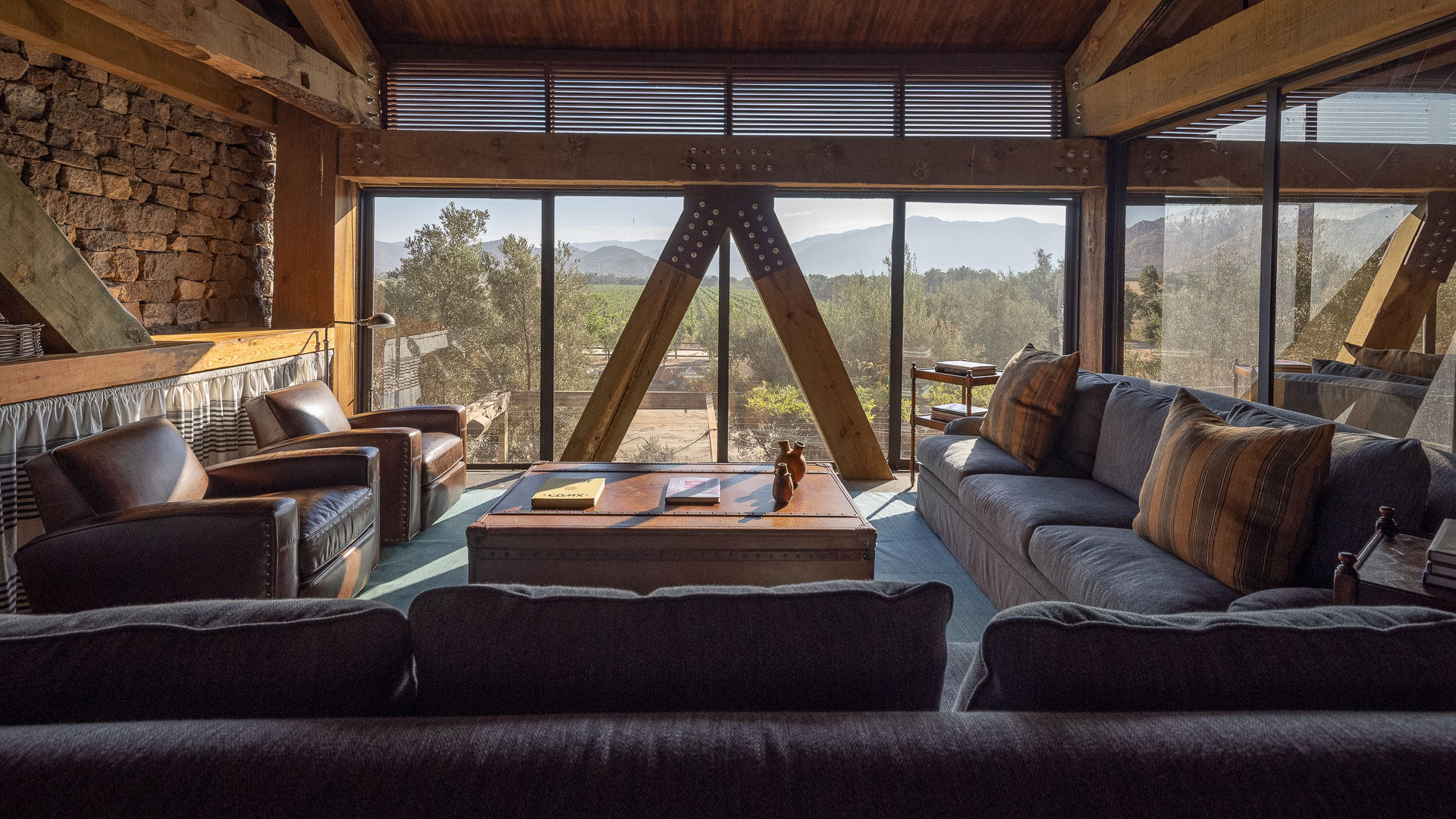 a living room with couches and a coffee table