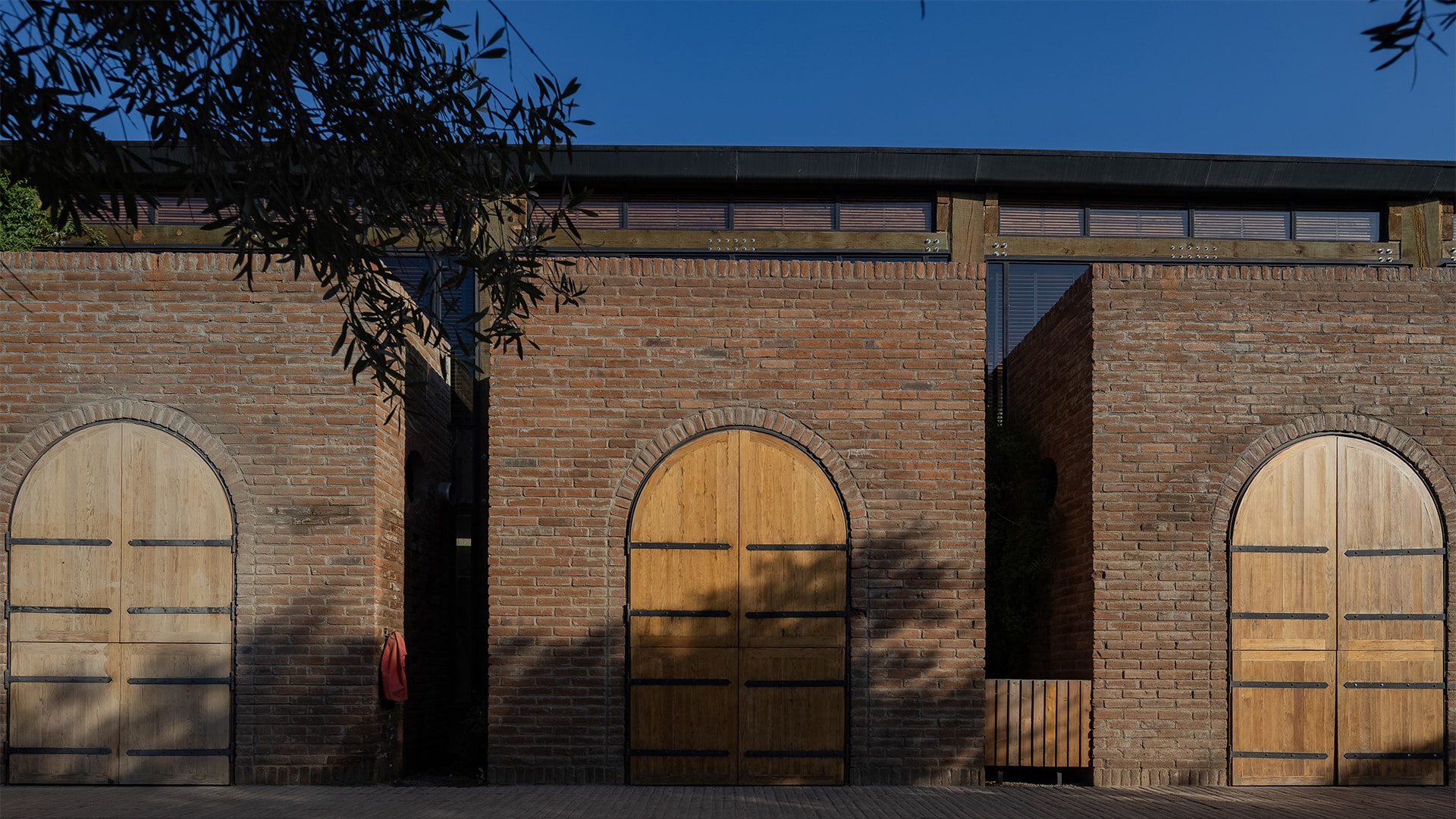 a brick building with a wooden door