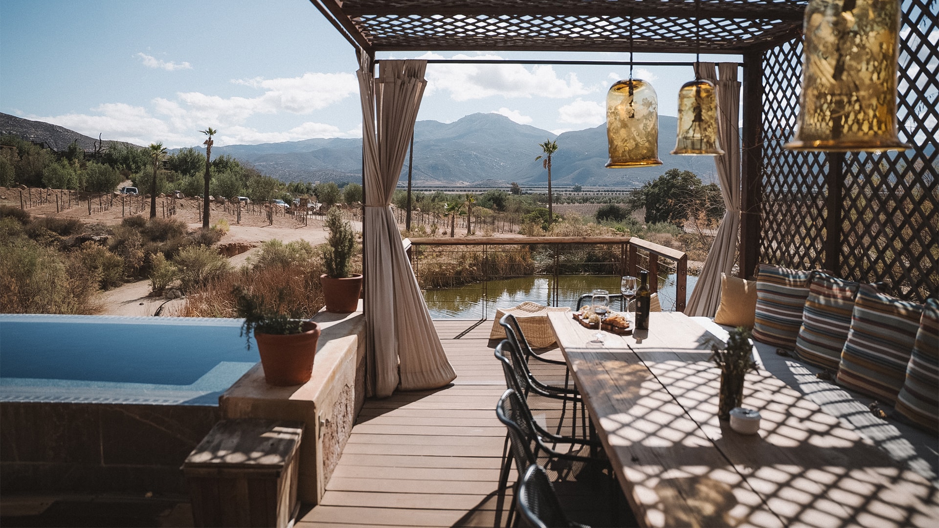 a table and chairs on a deck