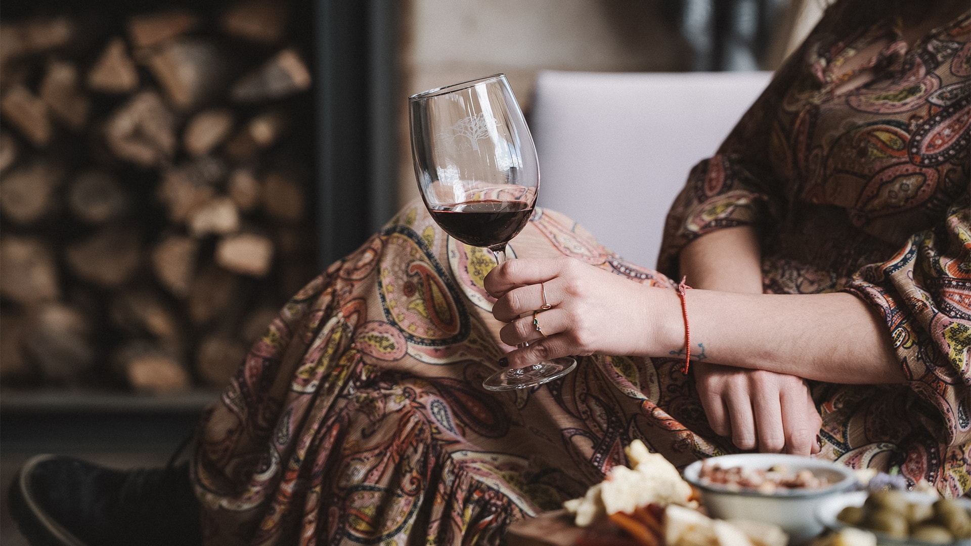 a woman holding a wine glass