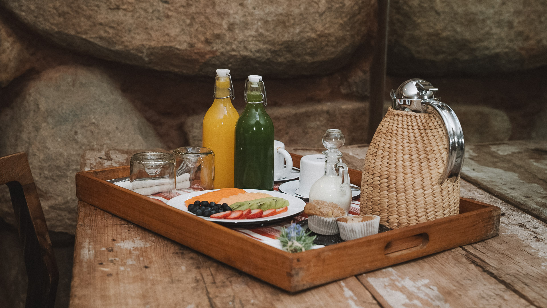 a tray of food and drinks on a table