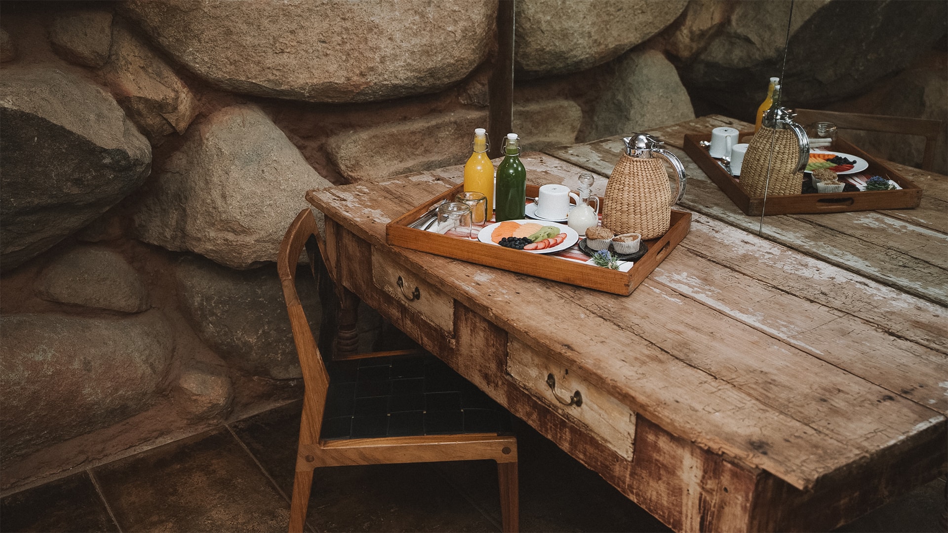 a tray of food on a wooden table