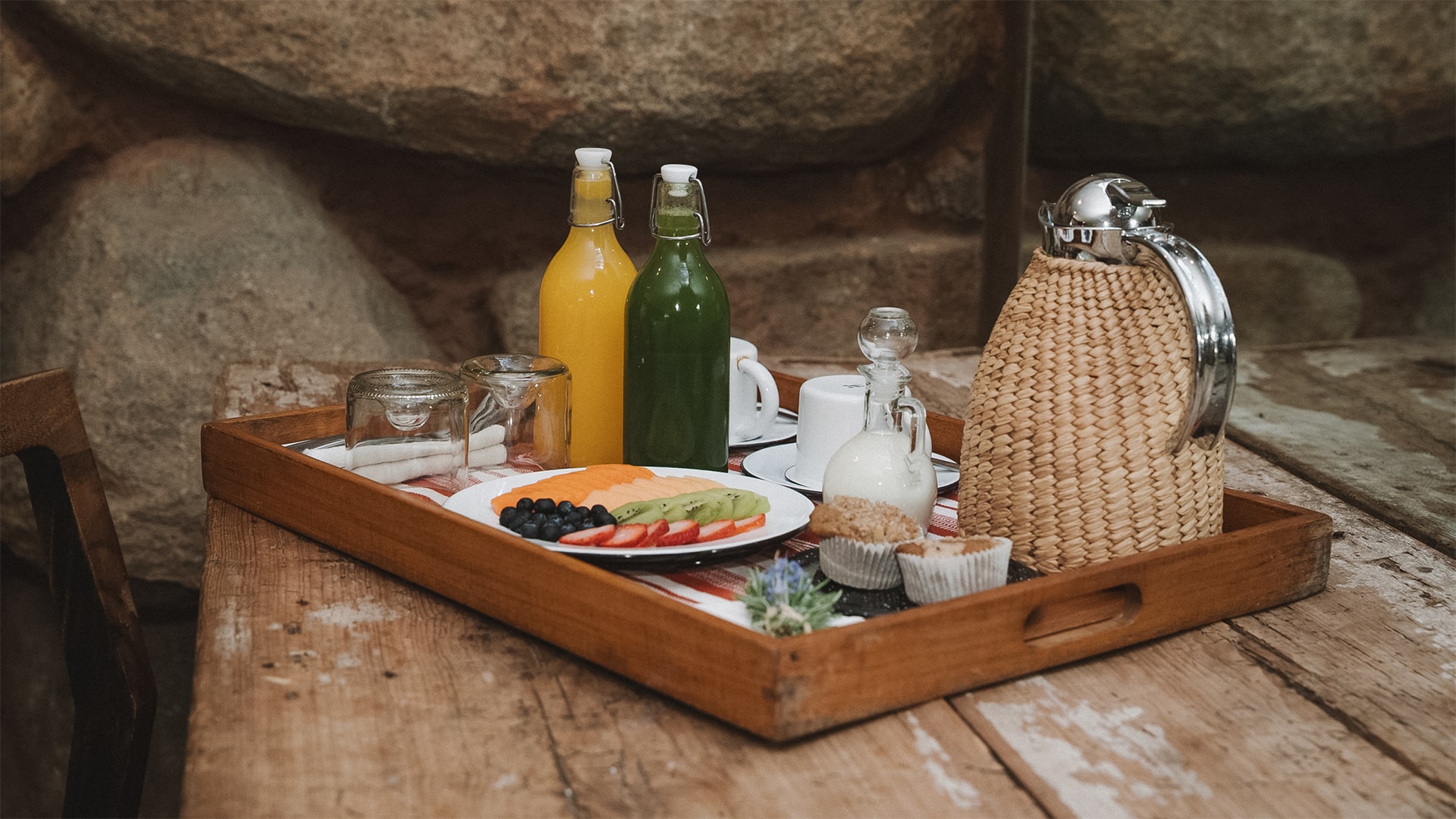 a tray of food and drinks on a table