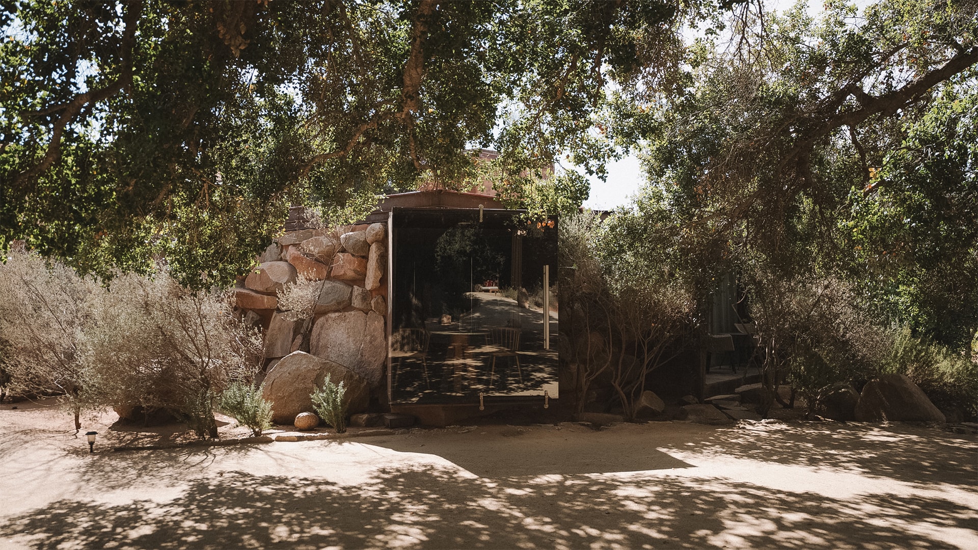 a glass door with a glass wall behind it