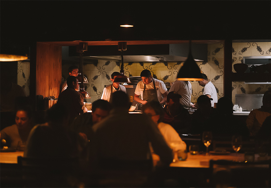 a group of people in a restaurant