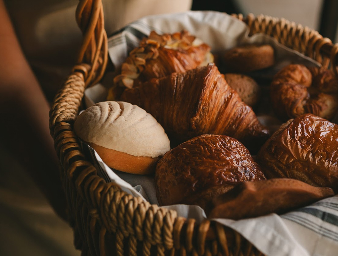 a basket of bread and rolls