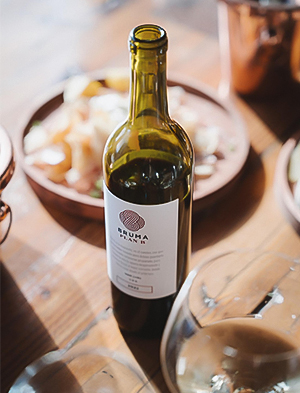 a bottle of wine on a table