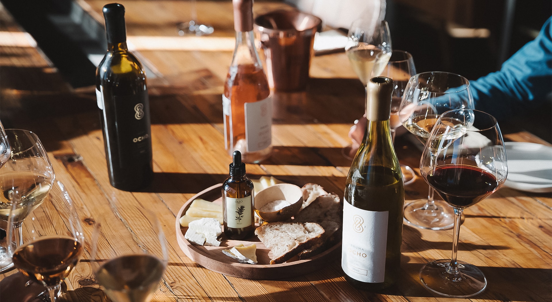 a plate of food and wine on a table