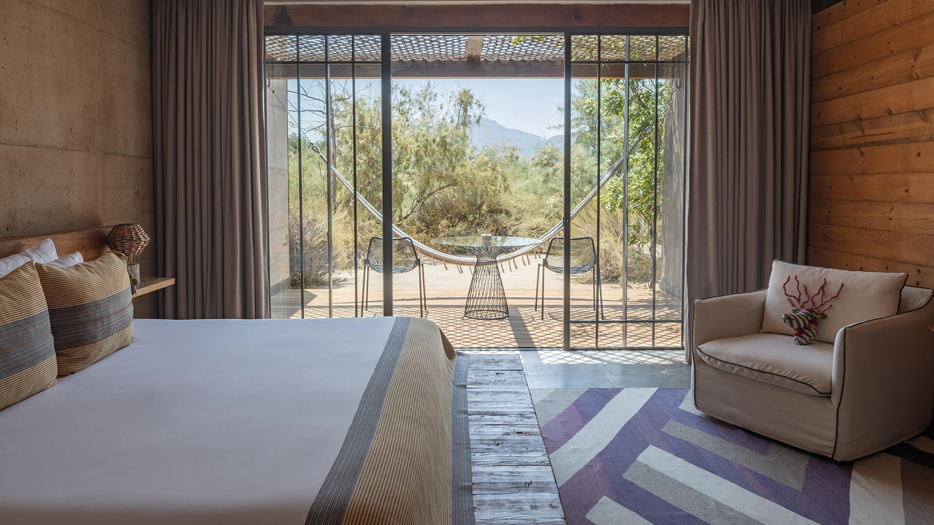 a room with a hammock outside