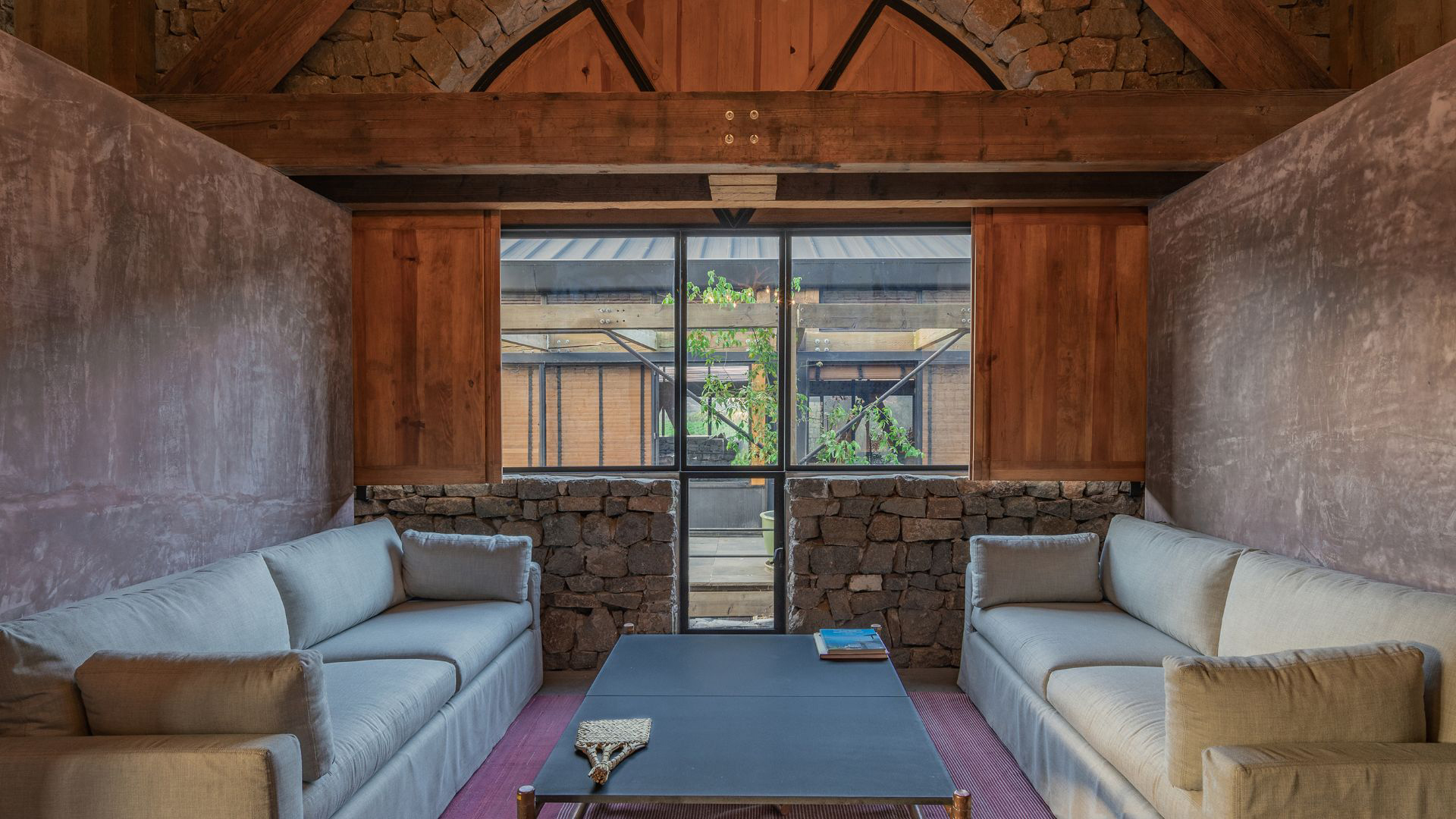 a room with couches and a table