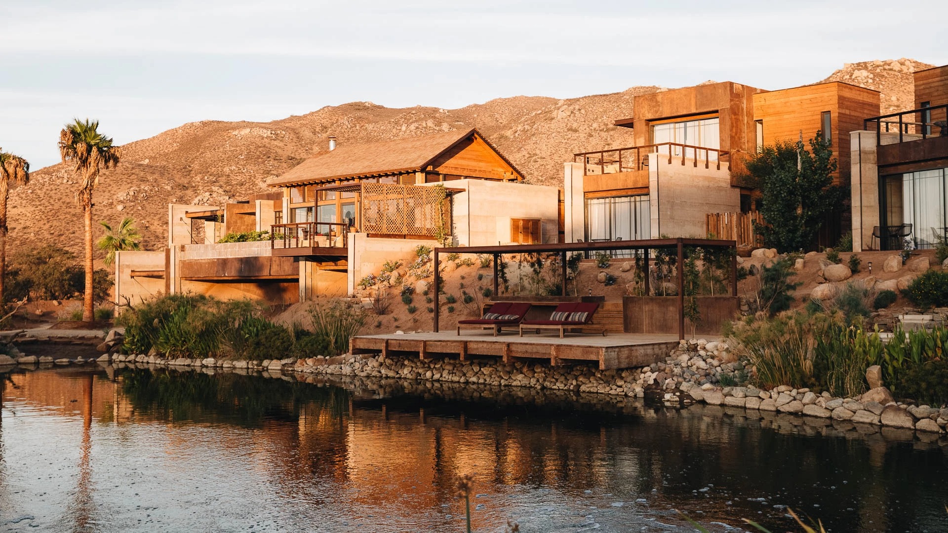 a house next to a body of water