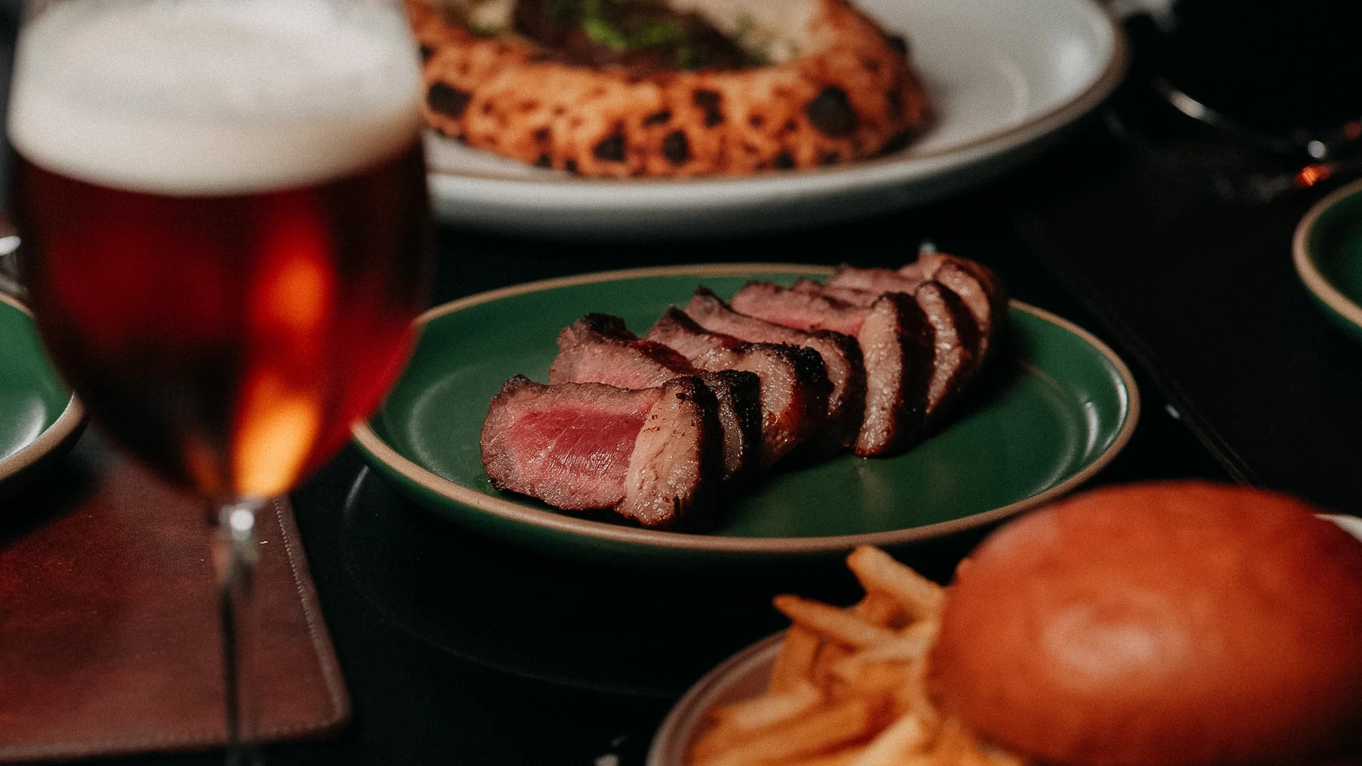 a plate of steak and french fries