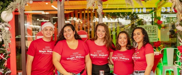 a group of women wearing red shirts