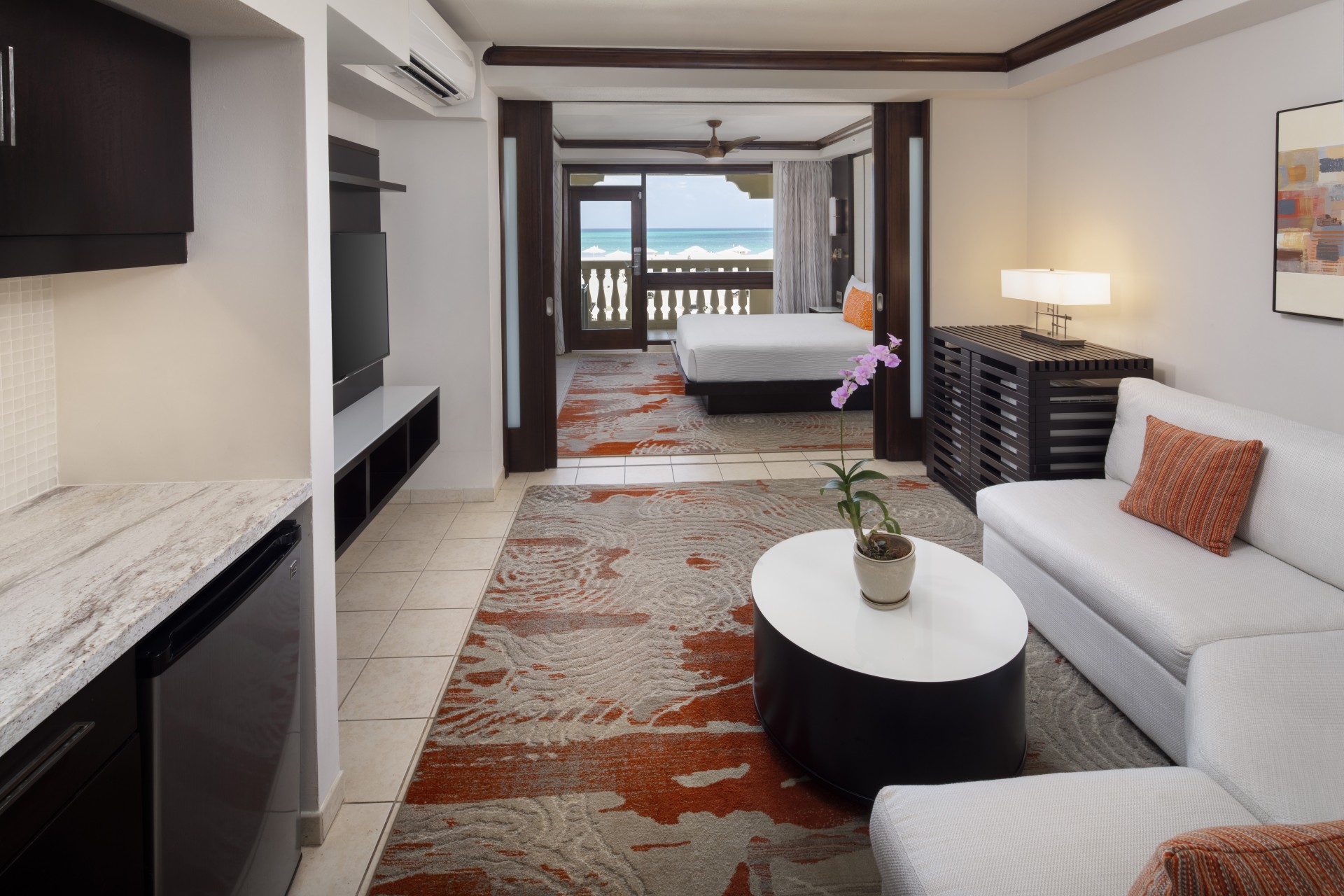 a room with a television and a couch