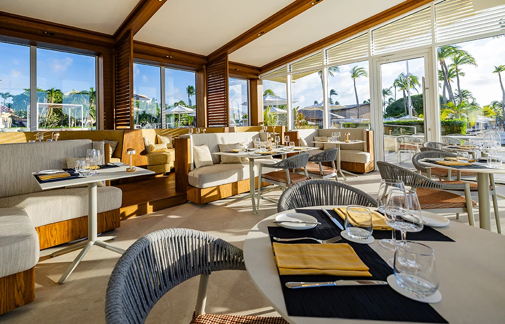 a restaurant with tables and chairs