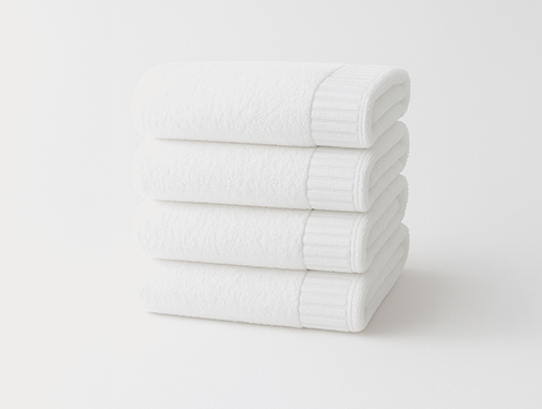 a stack of white towels