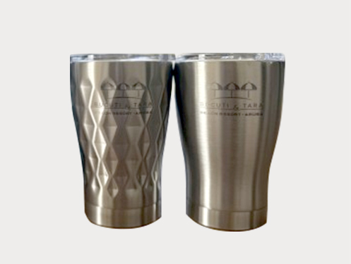 two silver cups with a diamond pattern