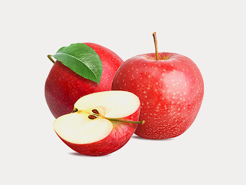 a group of red apples with a cut in half