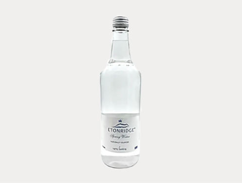 a clear bottle of liquid