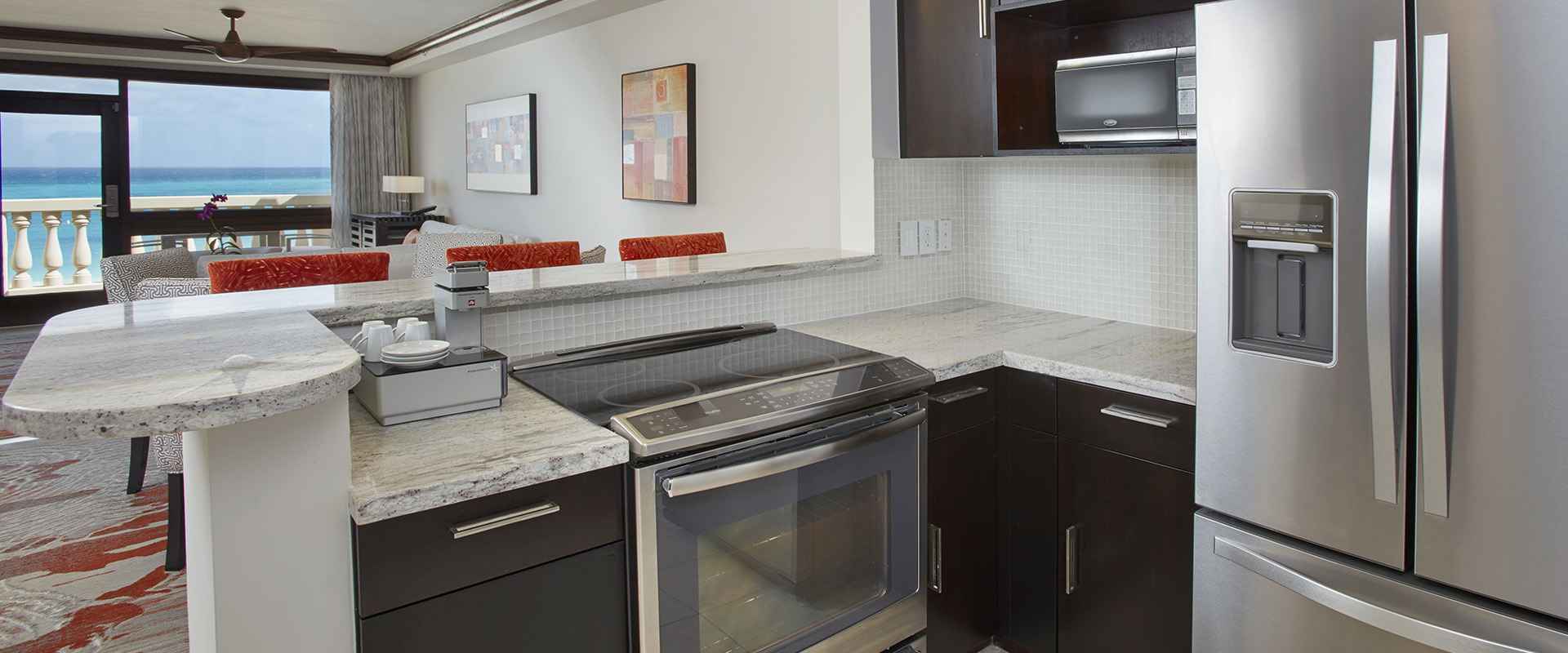 a kitchen with a stove and microwave