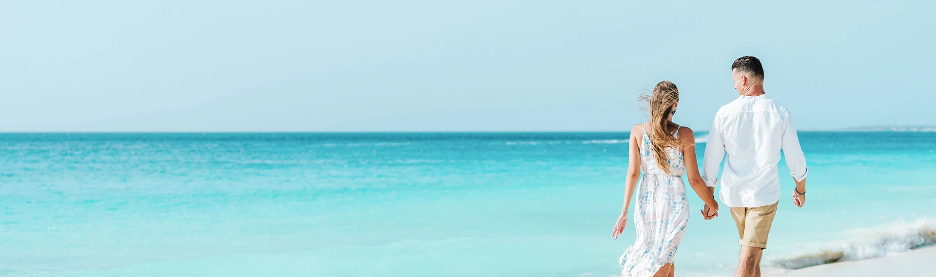 a blue ocean with a clear sky