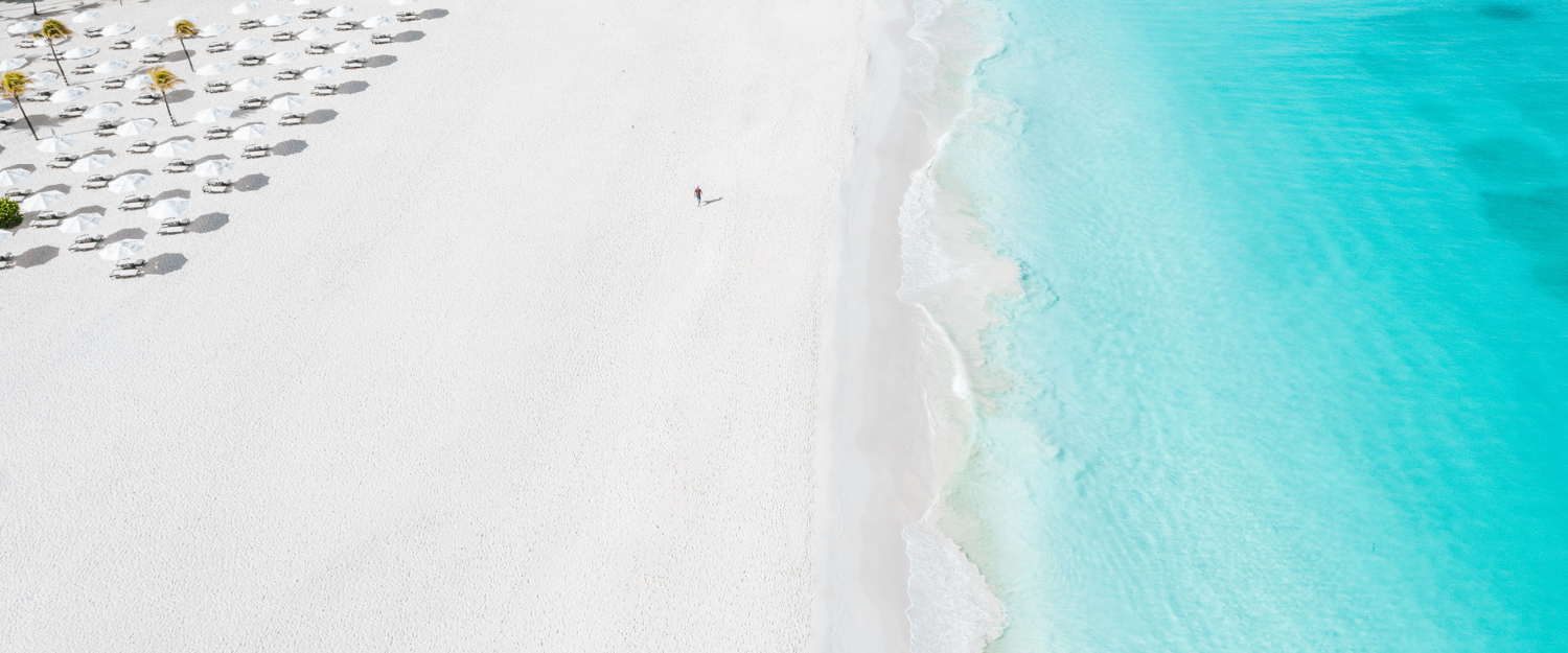 a person walking on a beach