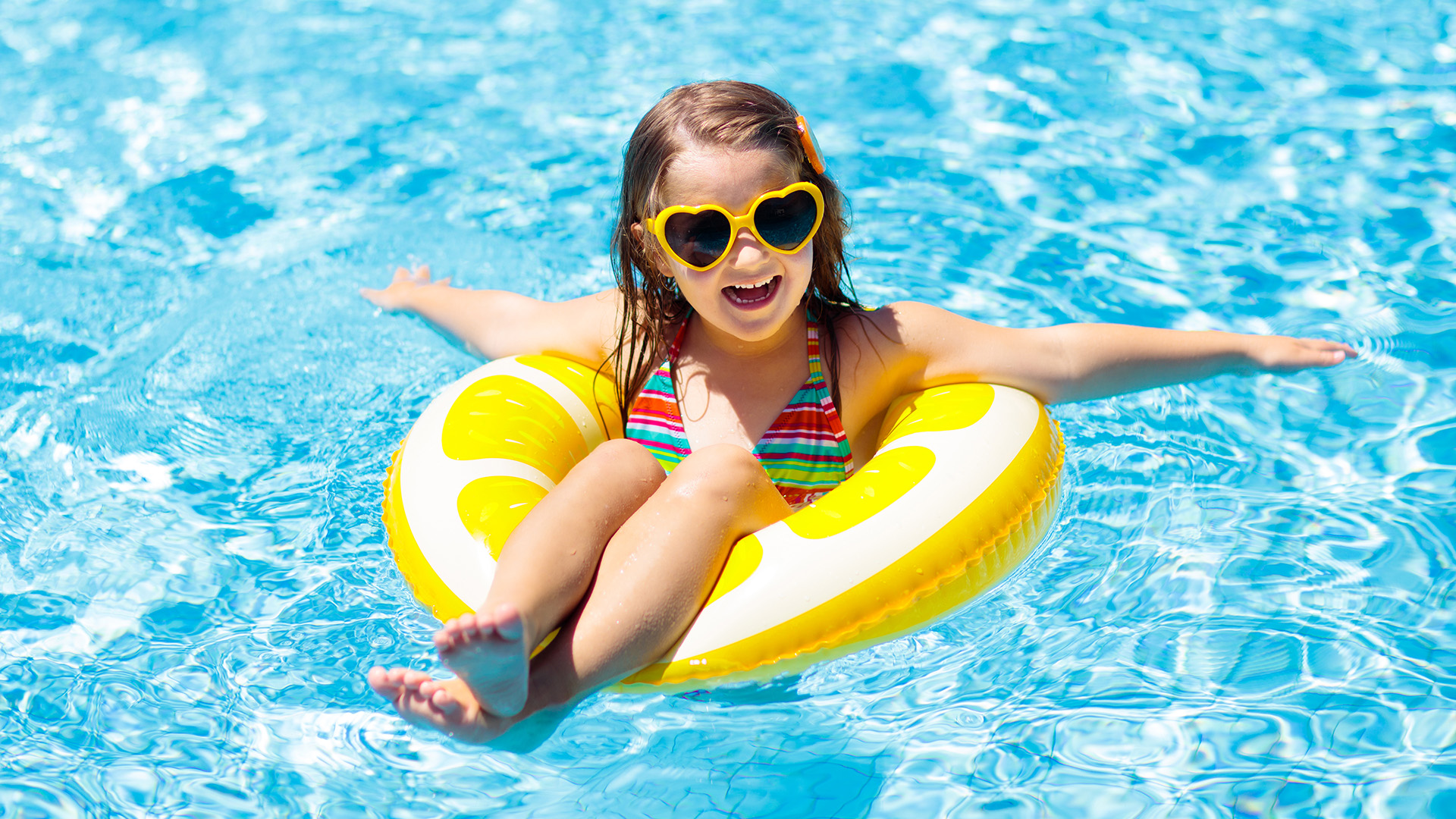 a girl in a swimming pool