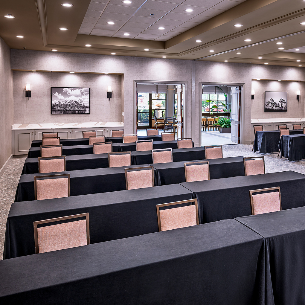 a room with tables and chairs