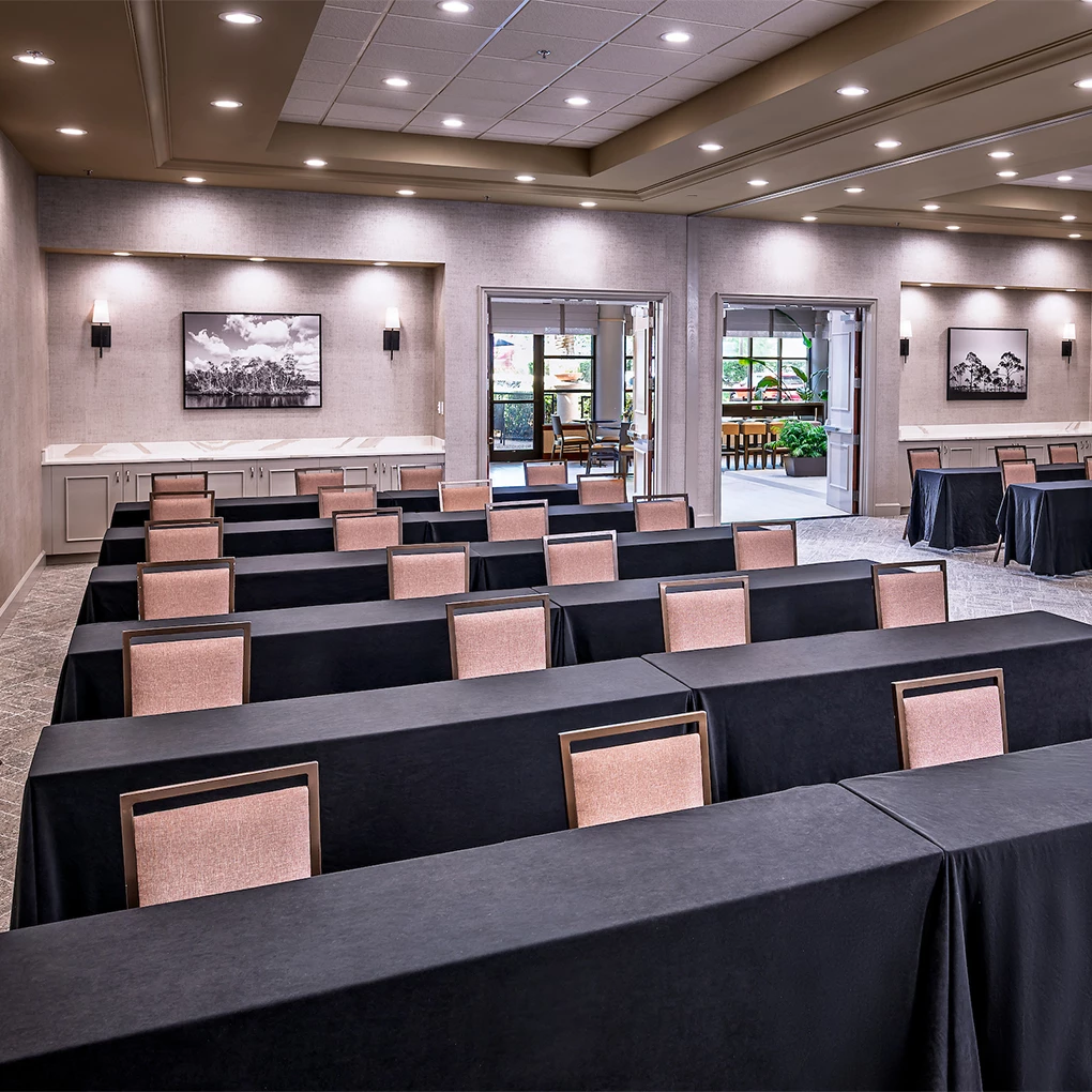 a room with tables and chairs