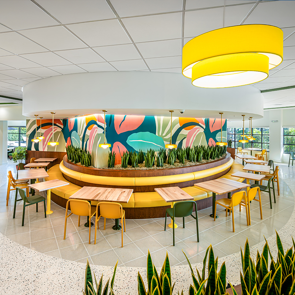a room with tables and chairs