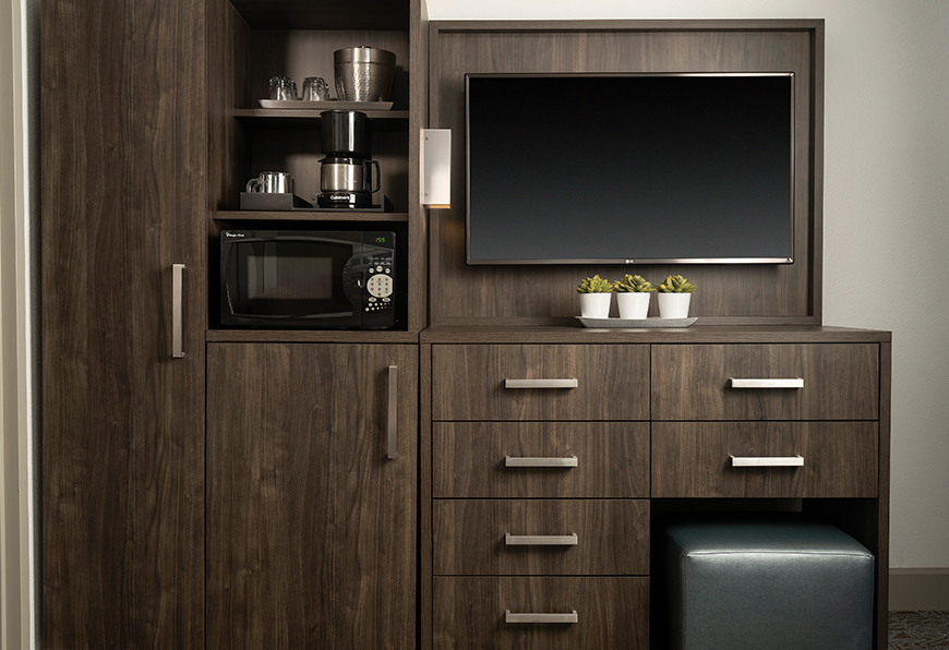 a tv on a shelf in a room