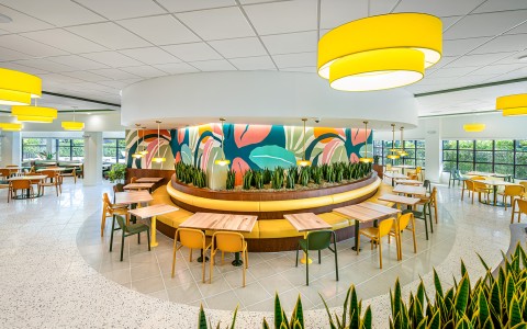 a restaurant with tables and chairs