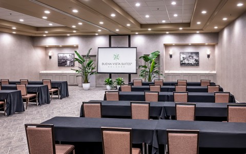 a room with tables and chairs