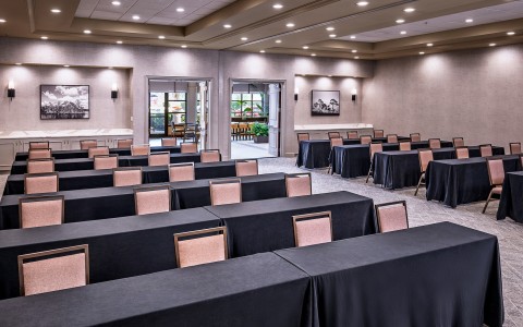 a room with tables and chairs
