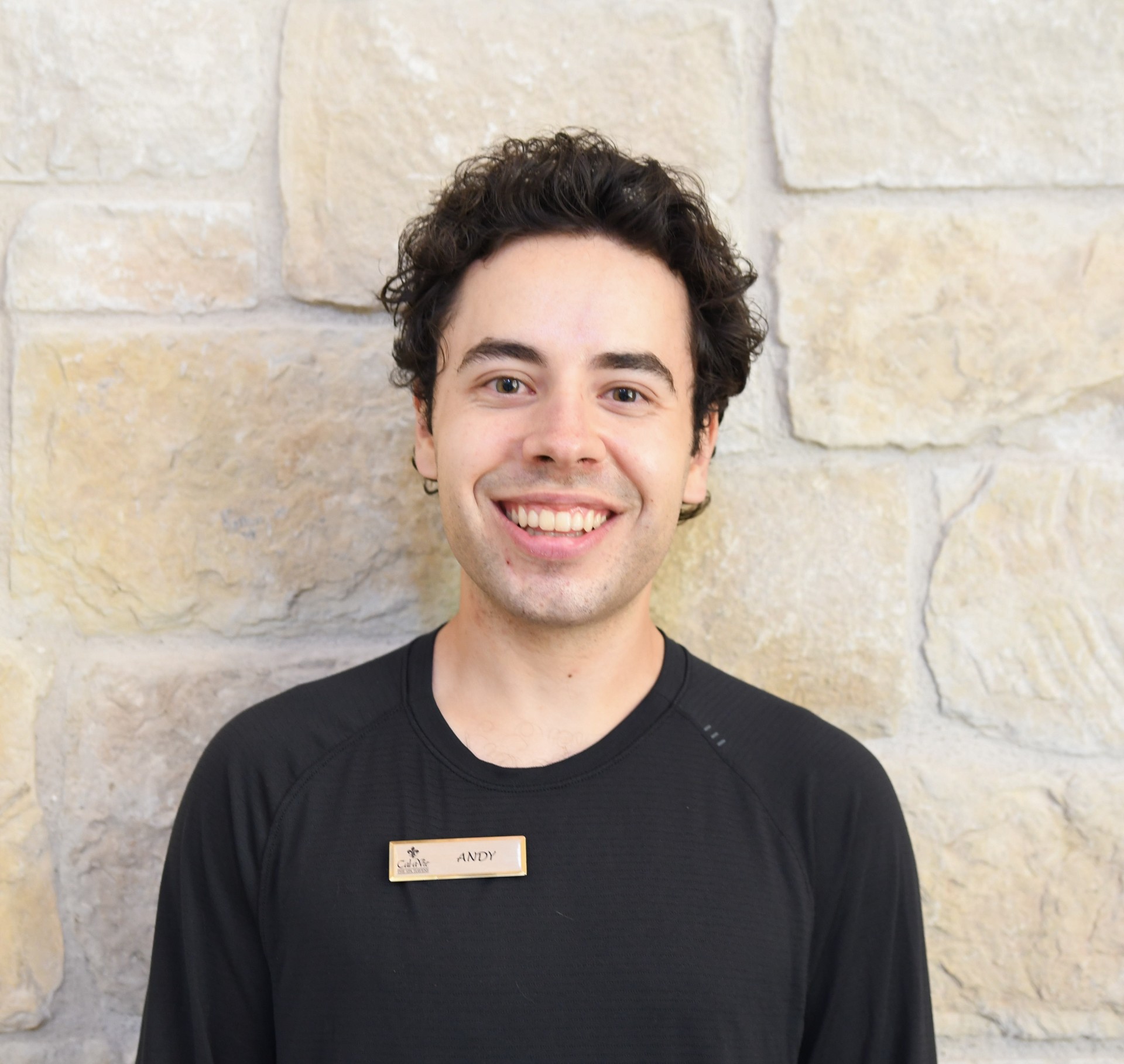 a man smiling at camera