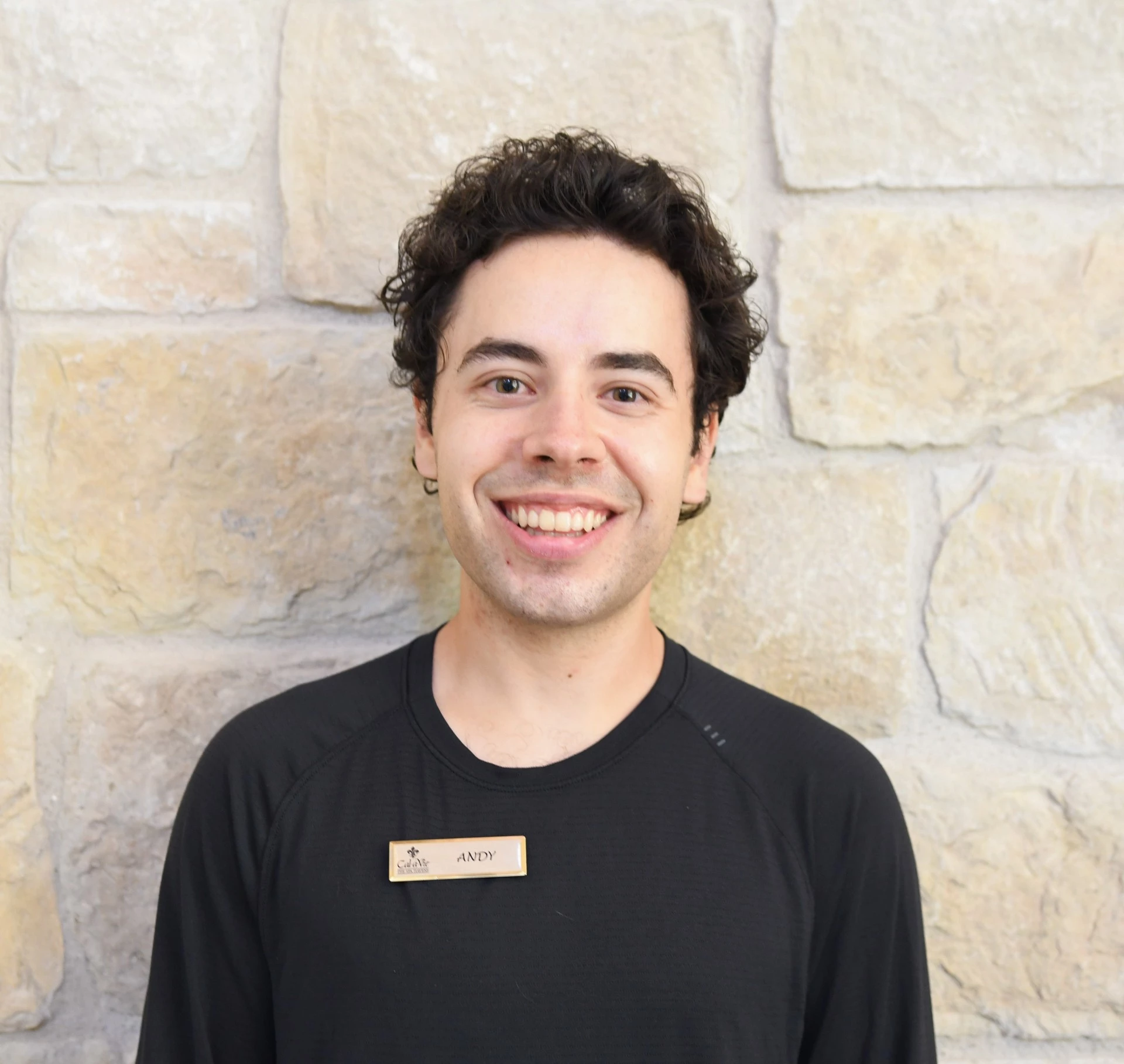 a man smiling at camera
