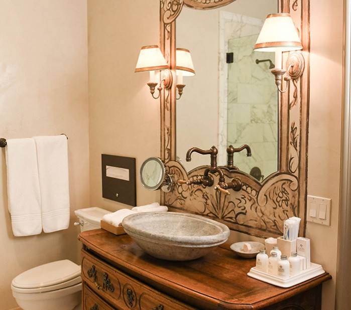 a bathroom with a large mirror